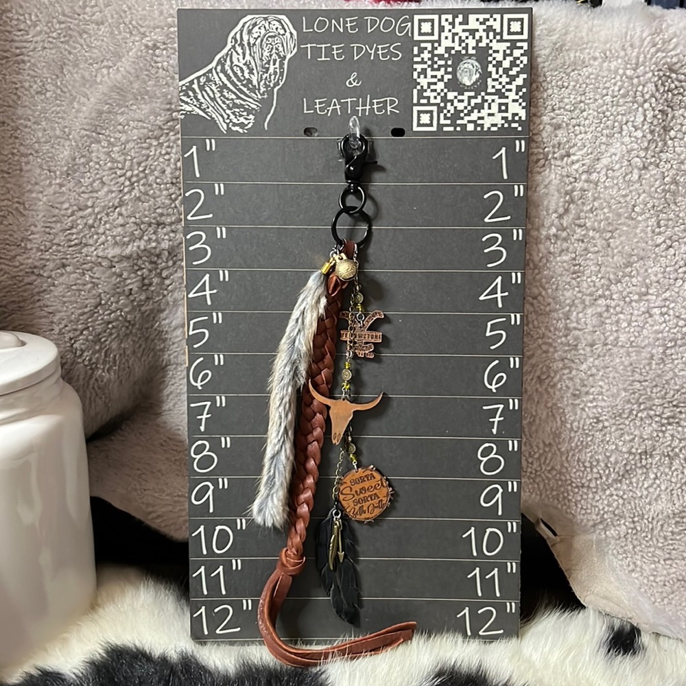 Fun and Unique Hand Crafted Leather and Feather Yellowstone Keychain with Charms